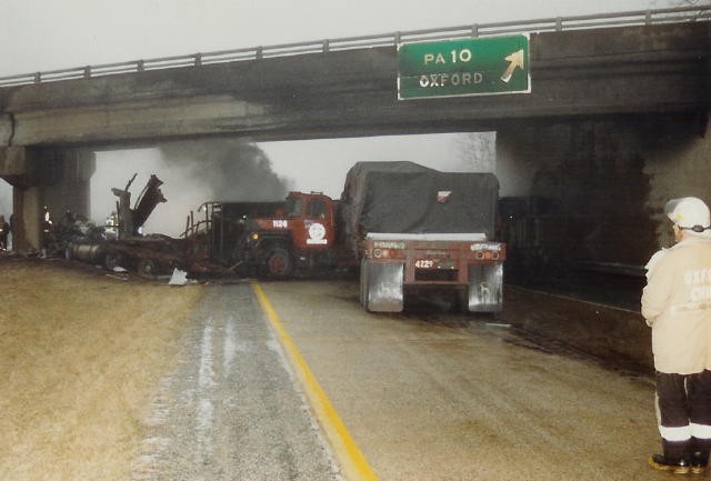 Chief Chuck Deaver overseeing a multi-vehicle crash involving fire on the northbound Route 1 bypass under Route 10.