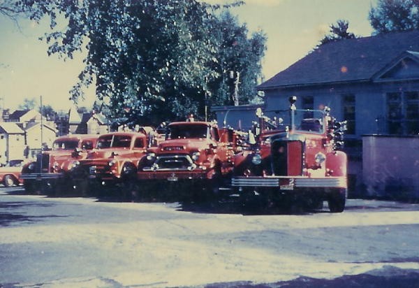 The apparatus parked on the northside of the firehouse where the current banquet hall now stands.