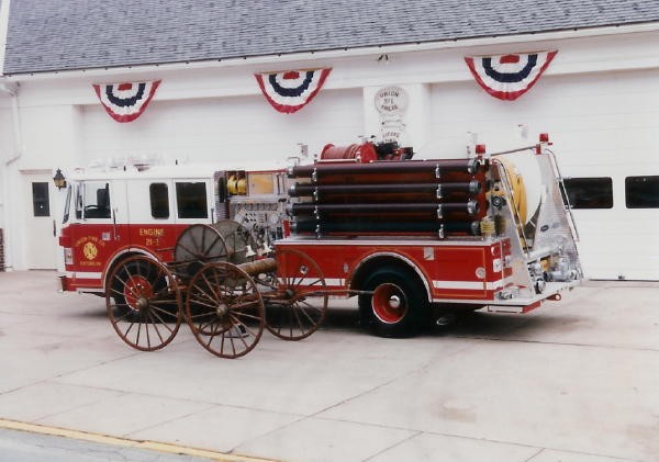 Engine 21-2 and the Hose Cart posing for pictures during the 125th Anniversary in 1996.