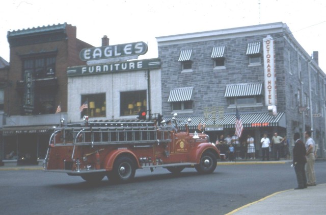 Engine 21-2 parading through the middle of town.