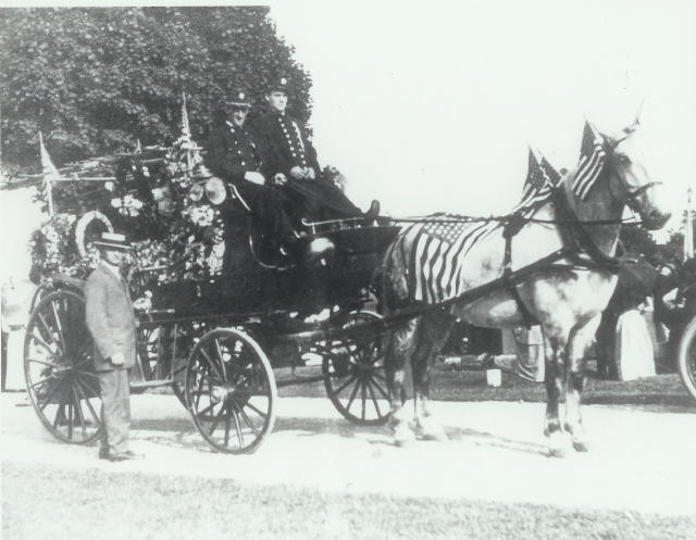 &quot;Old Bob&quot; in parade dress pulling a cart.