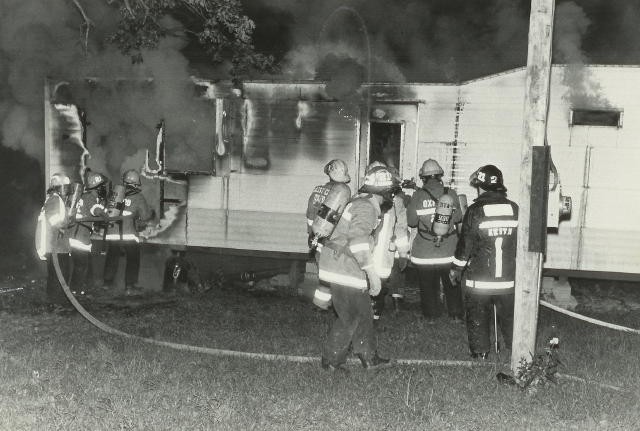 Crews operating at a mobile home fire on Grant Street.