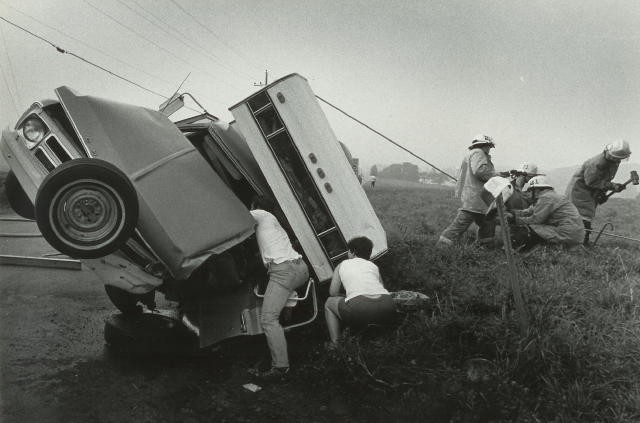 The EMS crew makes contact with the patient as the Rescue crew attempts to stabilize the vehicle at a crash on Route 272 in Chrome.