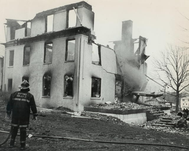 The controlled burn of the old mansion section of the firehouse in 1977.