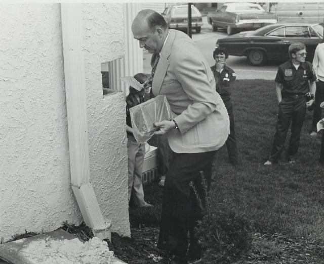 Bob Brown setting the corner stone of the new firehouse in 1978.