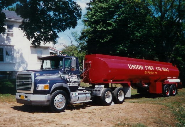 Tanker 21 with a temporary donated tractor from Tipton Trucking.