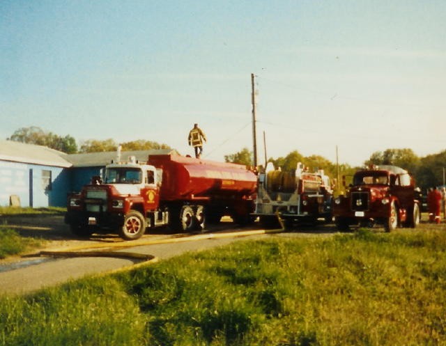 Tanker 21, Engine 21-2, and Rising Sun's Tanker 821 operating at a hay truck fire in Nottingham in the early 90's.