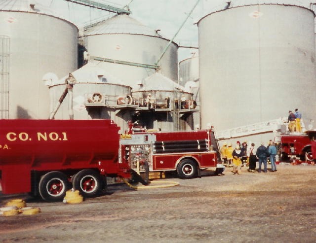 Crews operating at a grain dryer fire at Hostetter's Grain on Route 10 in 1990.