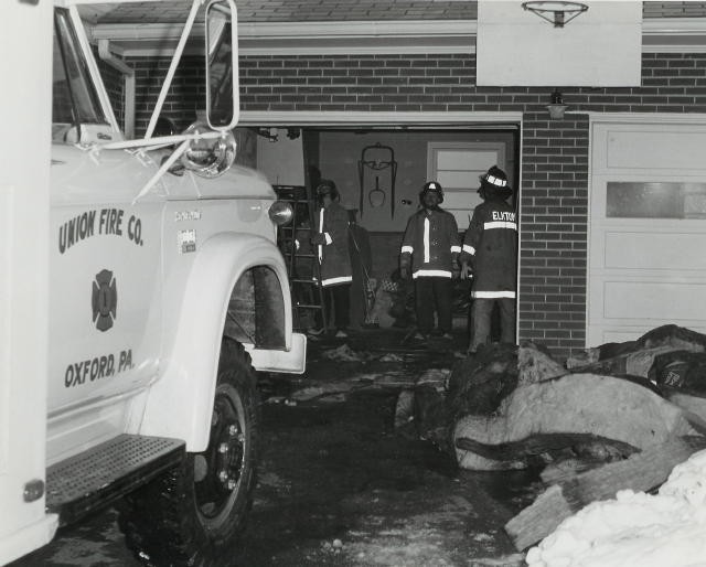 21-9, a brush truck, First-In at a House Fire during a snow storm in Elk Township.