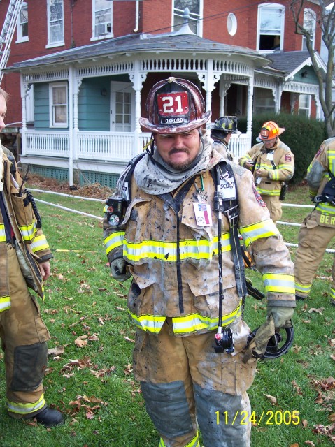Firefighter Frank Hersh covered in foam.