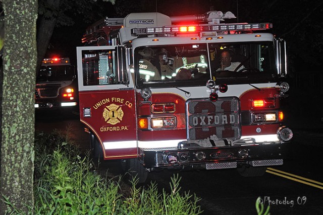 Steve Gray in Engine 21-2 at a Rising Sun fire.