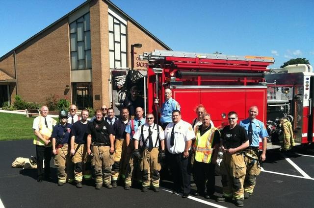 Group shot of the crews that responded to a Gas Leak prior to attending the Memorial Service for Past President Wood.  The local dry cleaners were very happy!!!