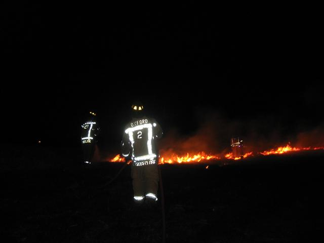 Crews operating at a brush fire on Limestone Road.