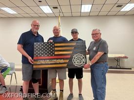 L-R: President Fowler, Chaplain Marty Wilson, Junior FF Shane Messner, Past President Larry Groseclose.