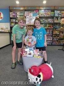 Carson was our winner of the Top Hat Toys basket!!